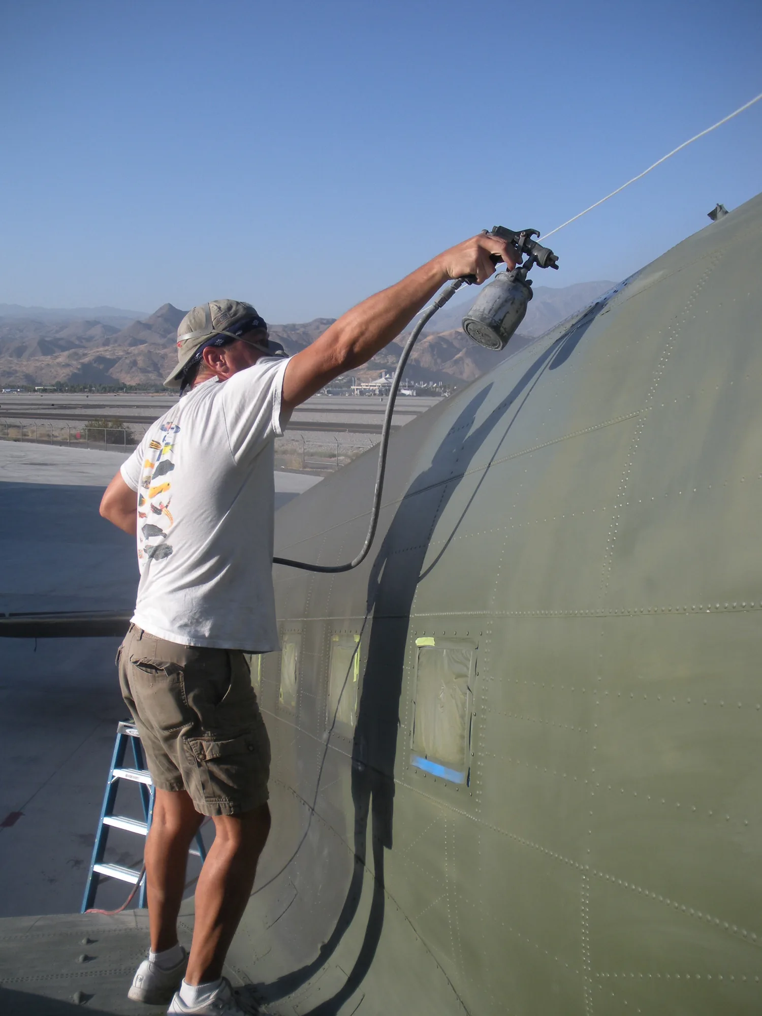 Jeff Givan painting an aircraft fuselage